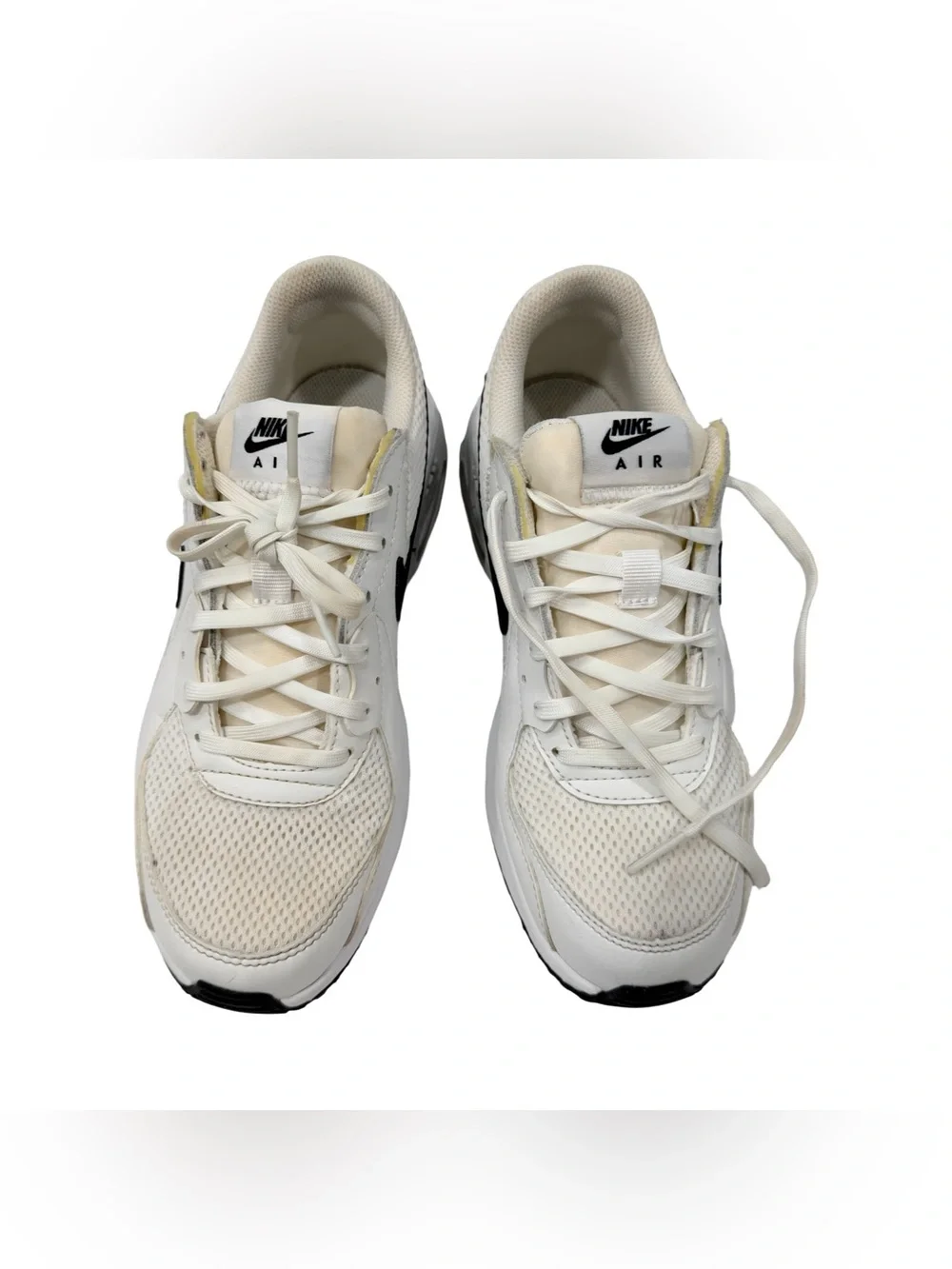 Nike White Sneakers with Black Swoosh